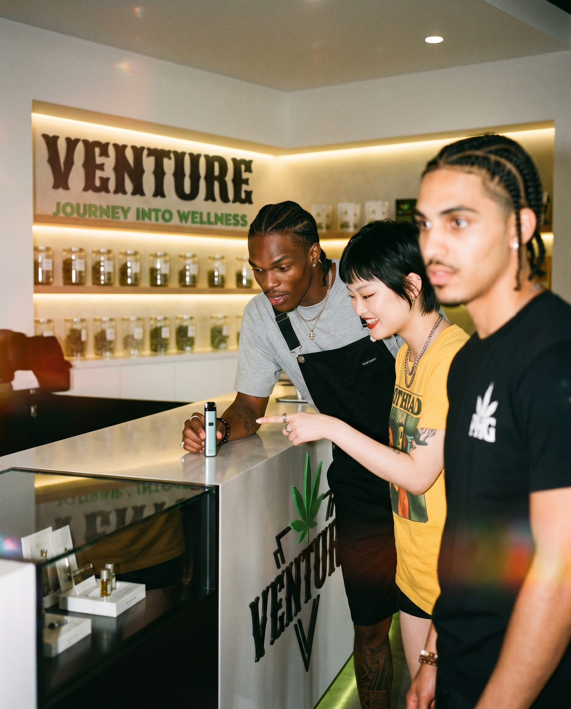People gathered at the Venture Dispensary counter.